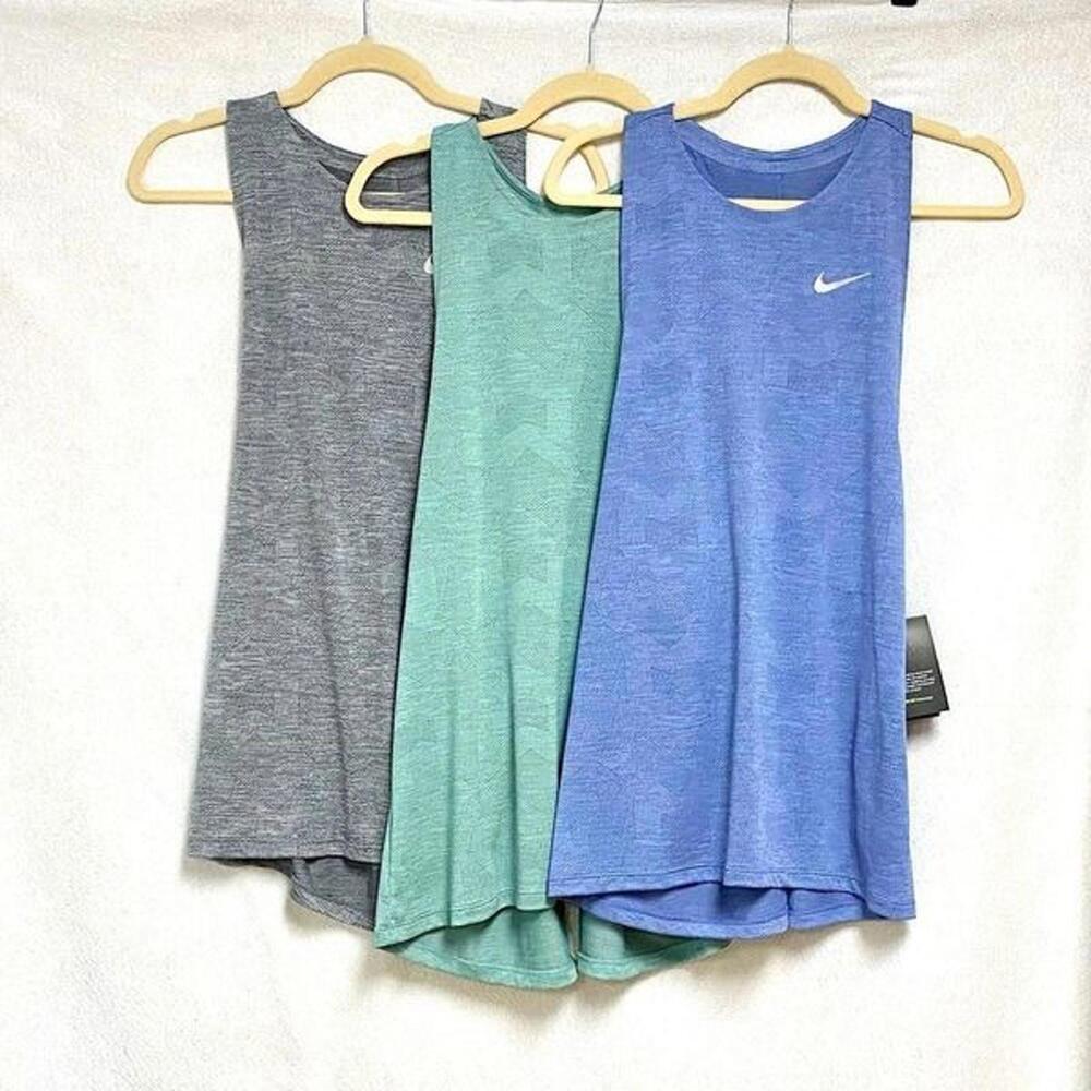 Lot of 3 brand new with tags Nike Dry medalist running tanks. All size large
